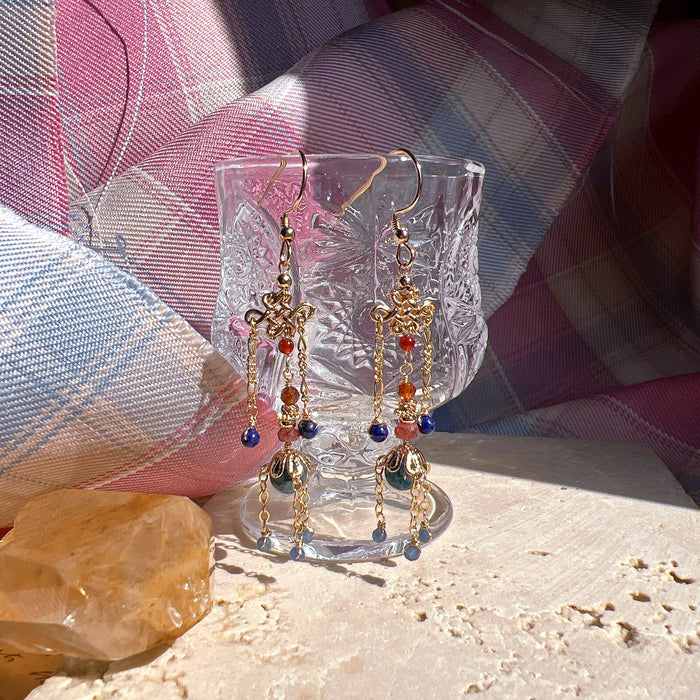 Earrings: 梨颊微涡