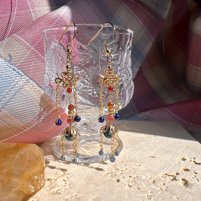 Earrings: 梨颊微涡